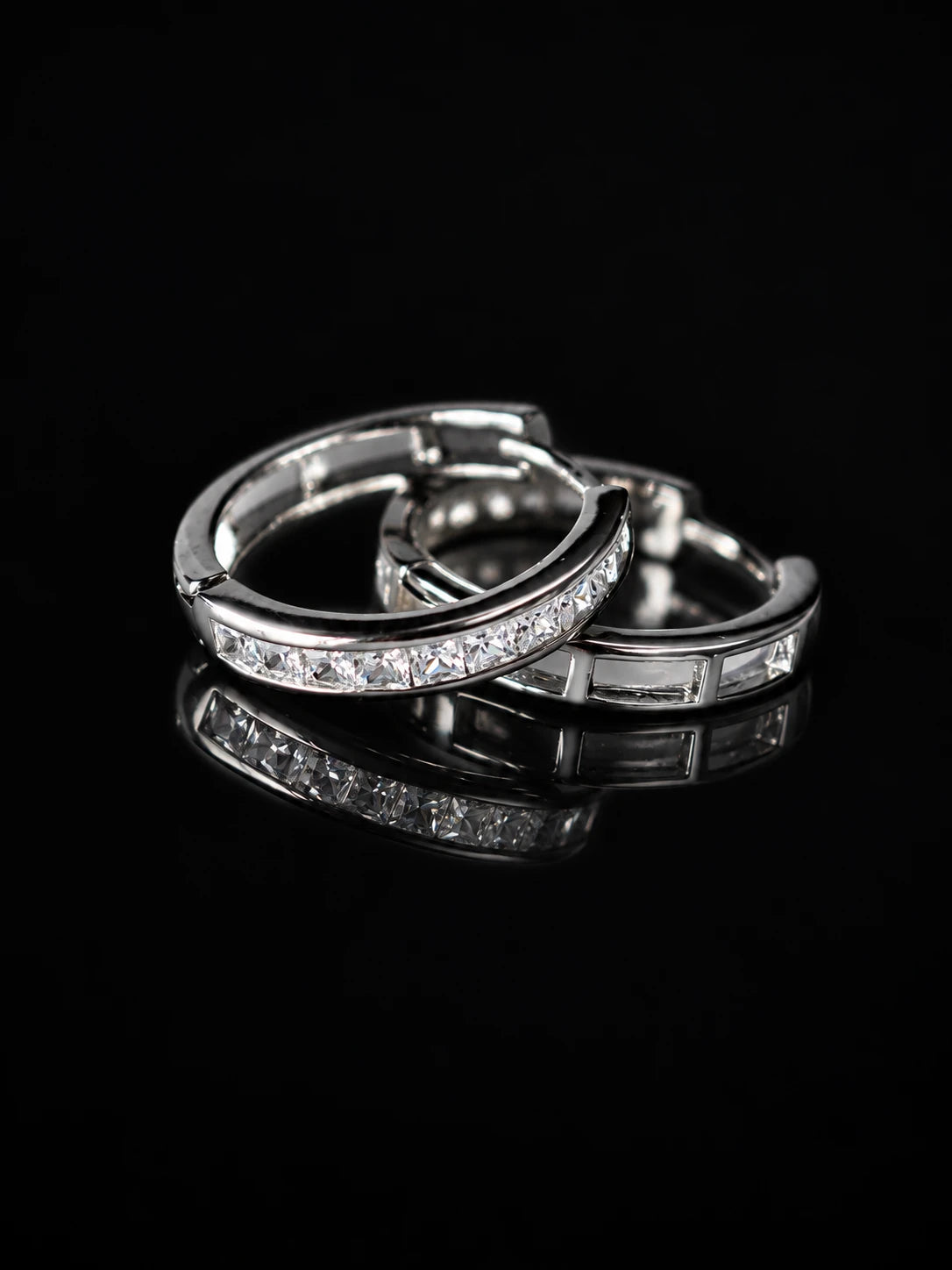 Silver Baguette Channel Hoops on a black background
