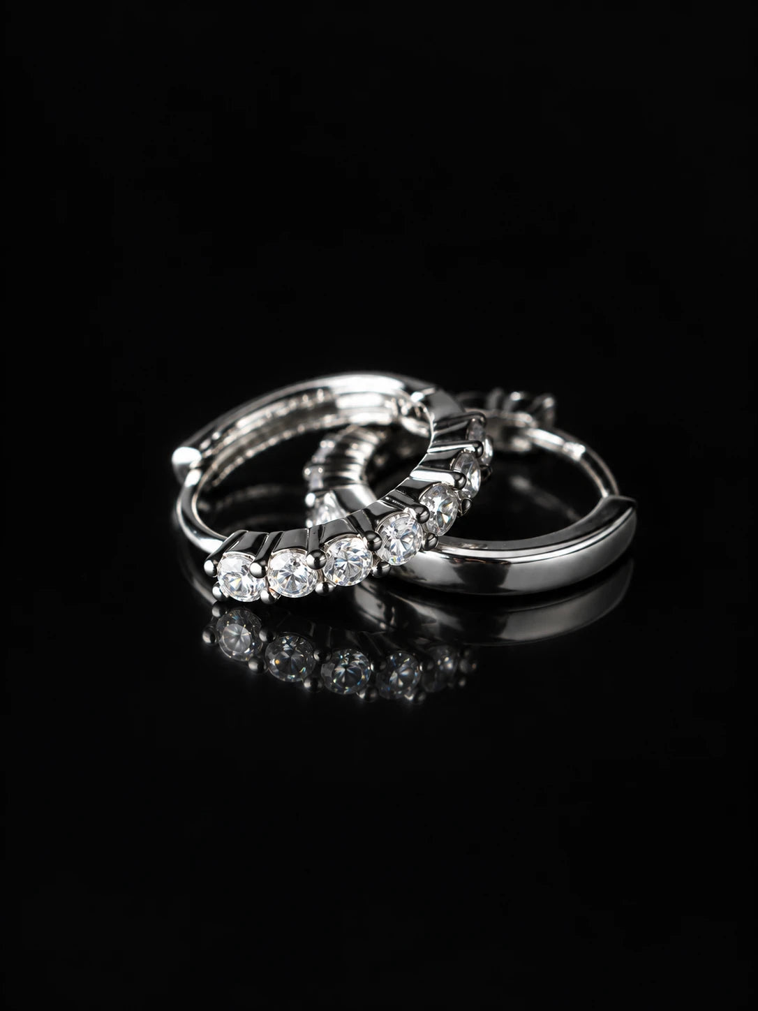Silver Round Prong Hoops on a black background