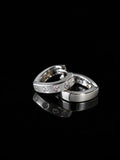 Silver Dot CZ Huggies on a black background