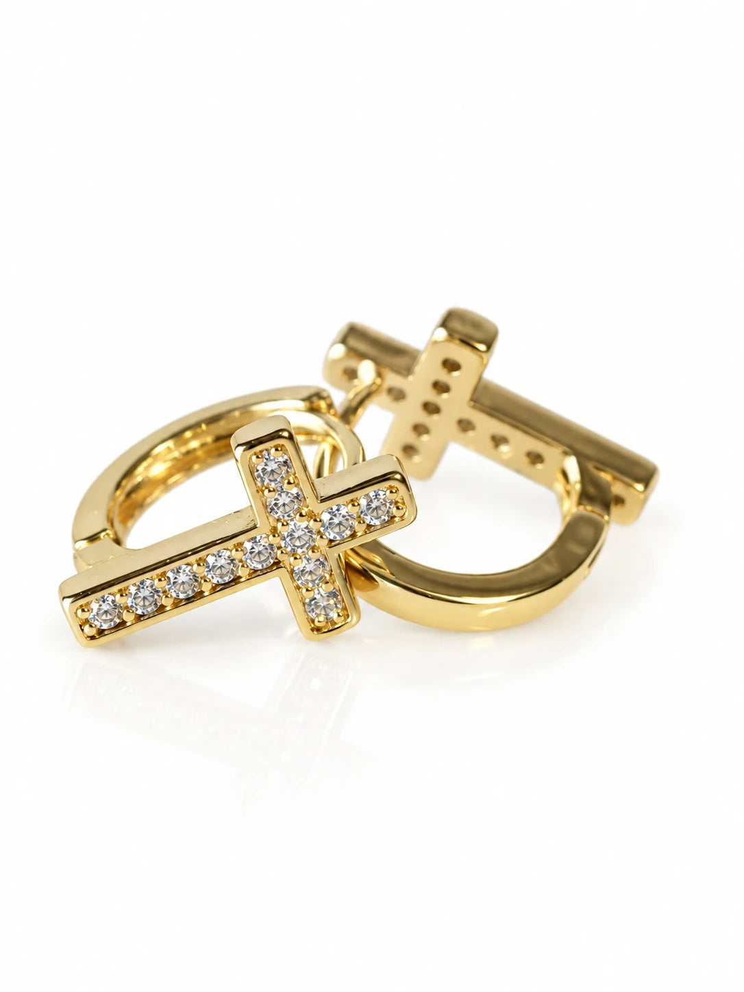 Gold Cross CZ Huggies on a white background