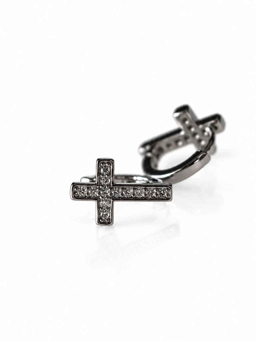 Black & Silver Cross CZ Huggies on a white background