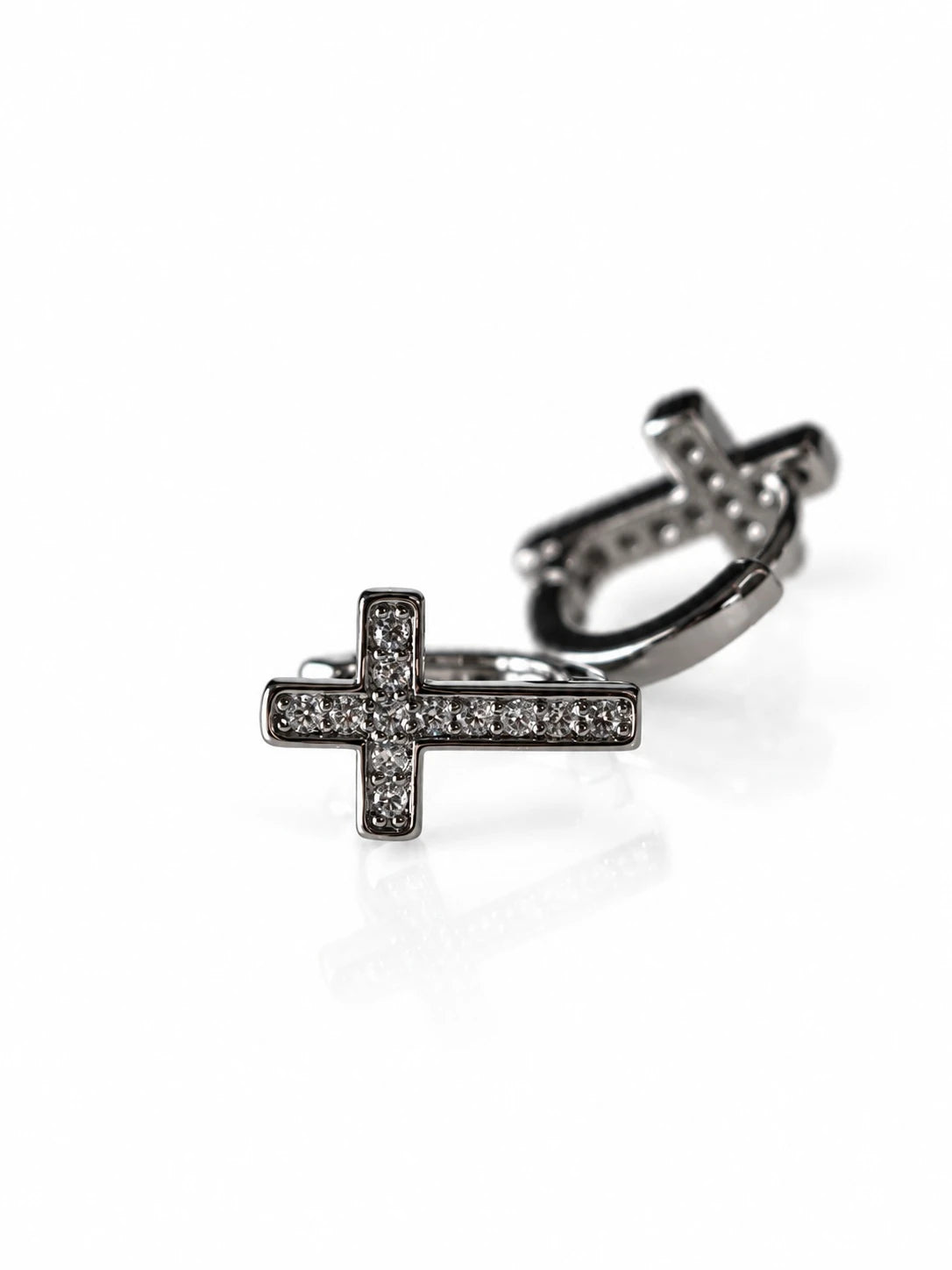 Black & Silver Cross CZ Huggies on a white background