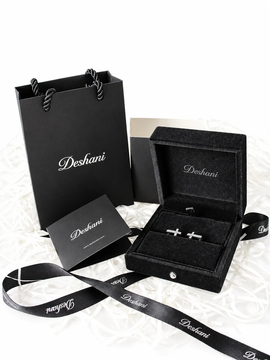 Black & Silver Cross CZ Huggies in Deshani gift-ready packaging
