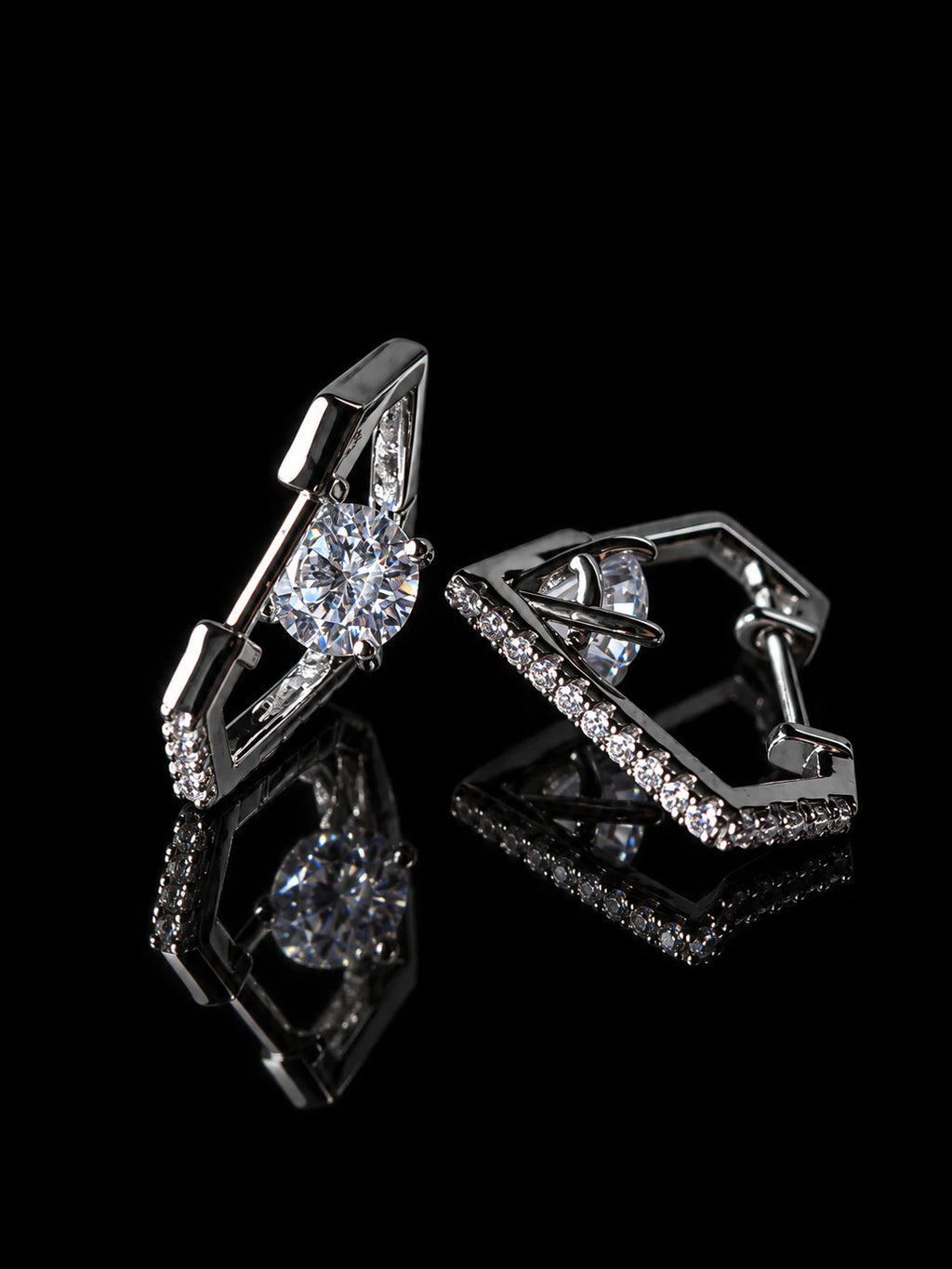 Silver Marquise Halo Huggies on a black background