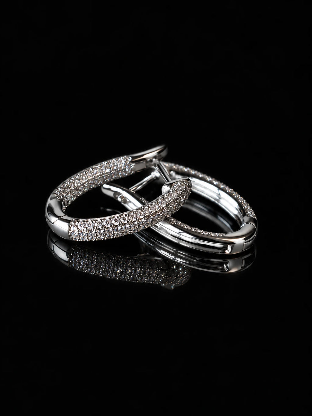 Silver Pave Oval Hoops on a black background