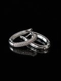 Silver Pave Oval Hoops on a black background