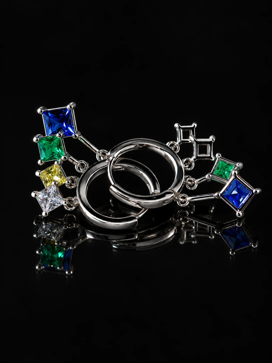 Silver Rainbow Princess Hoops on a black background