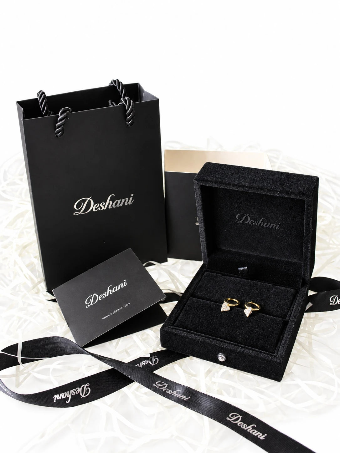 Gold Heart Charm Hoops in Deshani gift-ready packaging