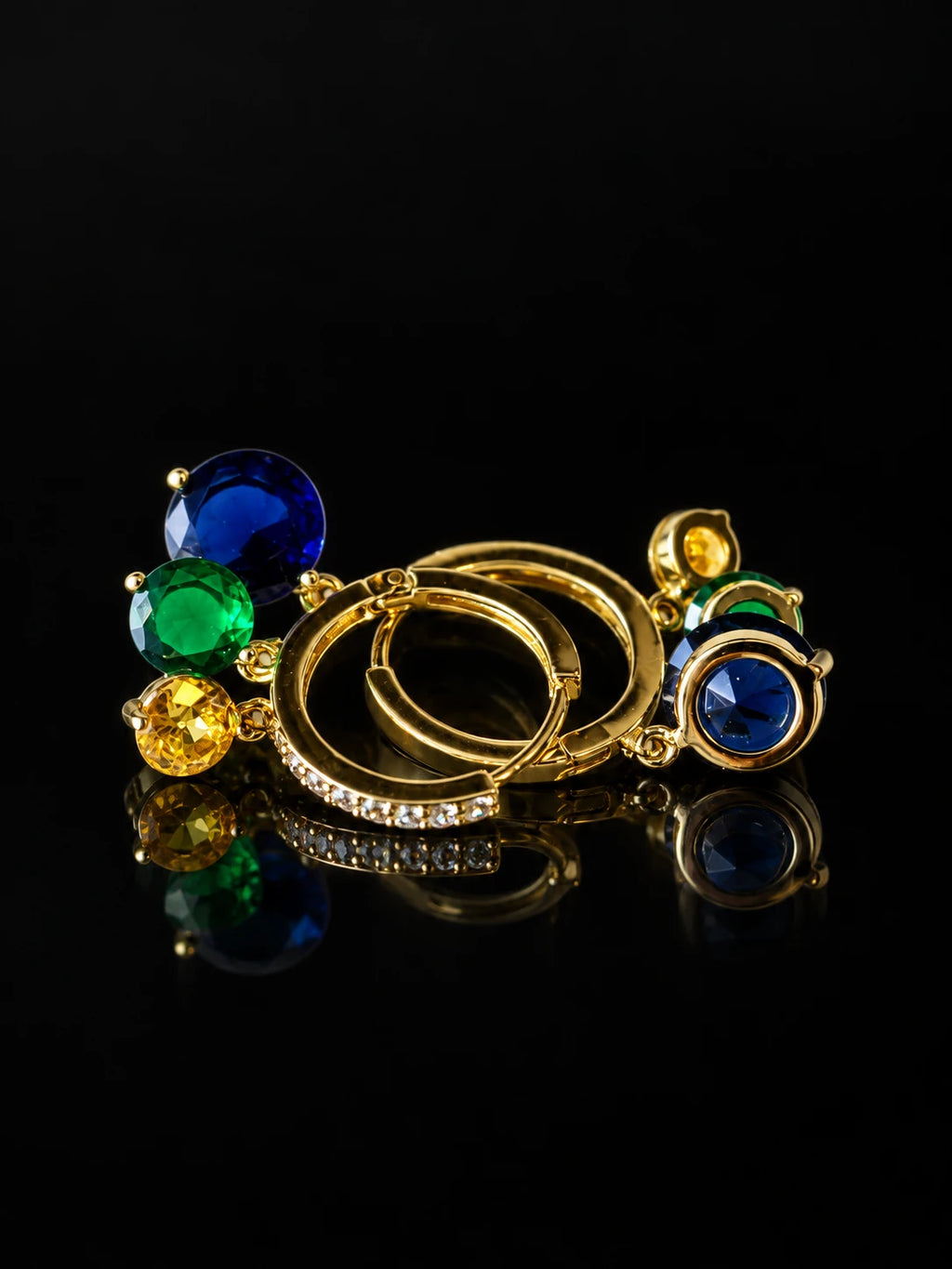 Gold Sapphire Charm Hoops on a black background