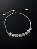 Silver Pavé U-Cuff Bracelet on a black background