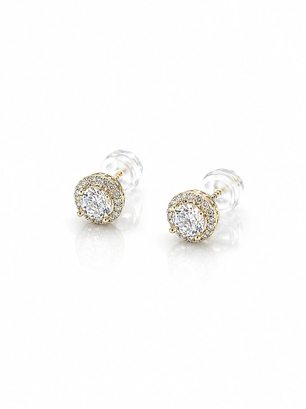 Gold CZ Starburst Stud Earrings on a white background