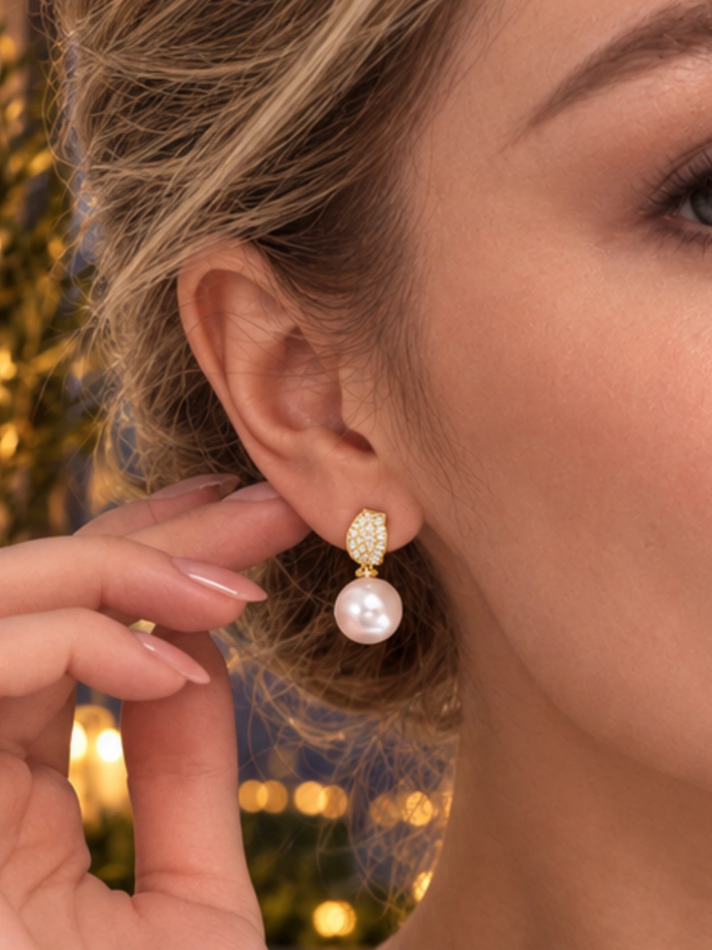Alternate close-up of Gold Pearl Pave Studs being worn