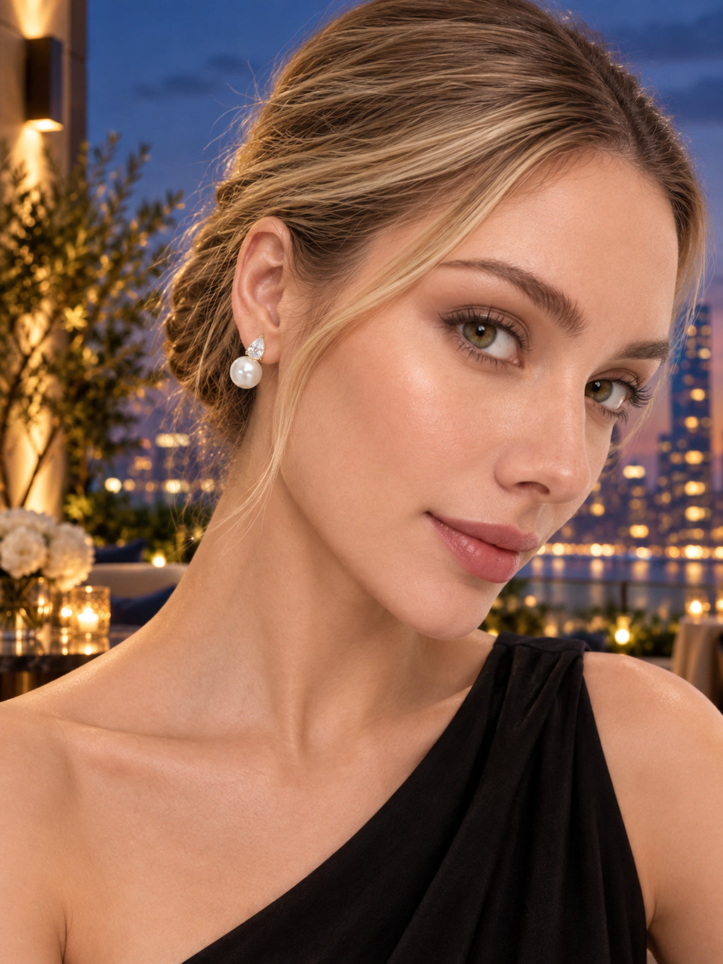 Close-up of Gold Pearl Pear Accent Studs being worn