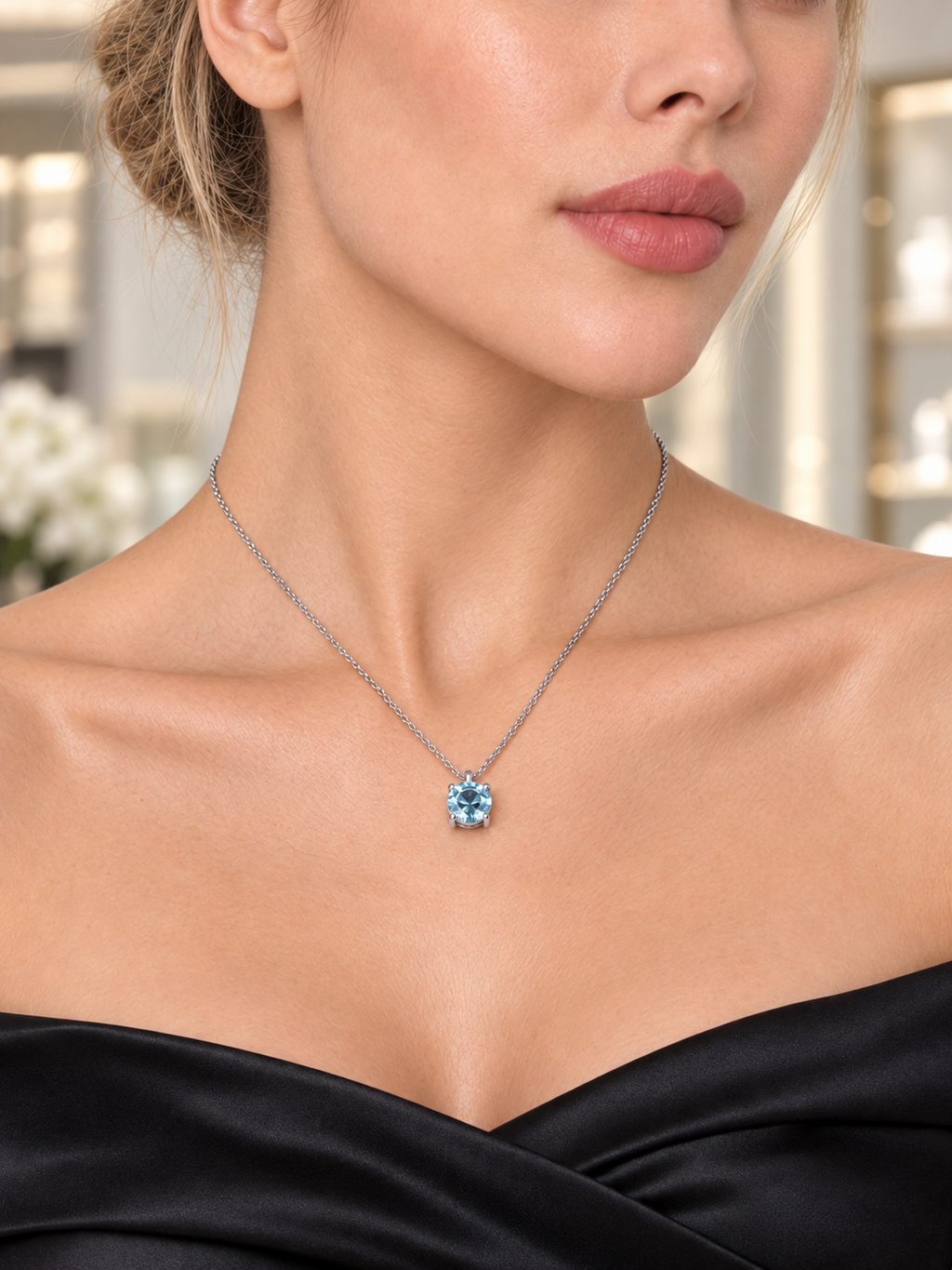 Close-up of Ice Blue CZ Pendant Necklace being worn
