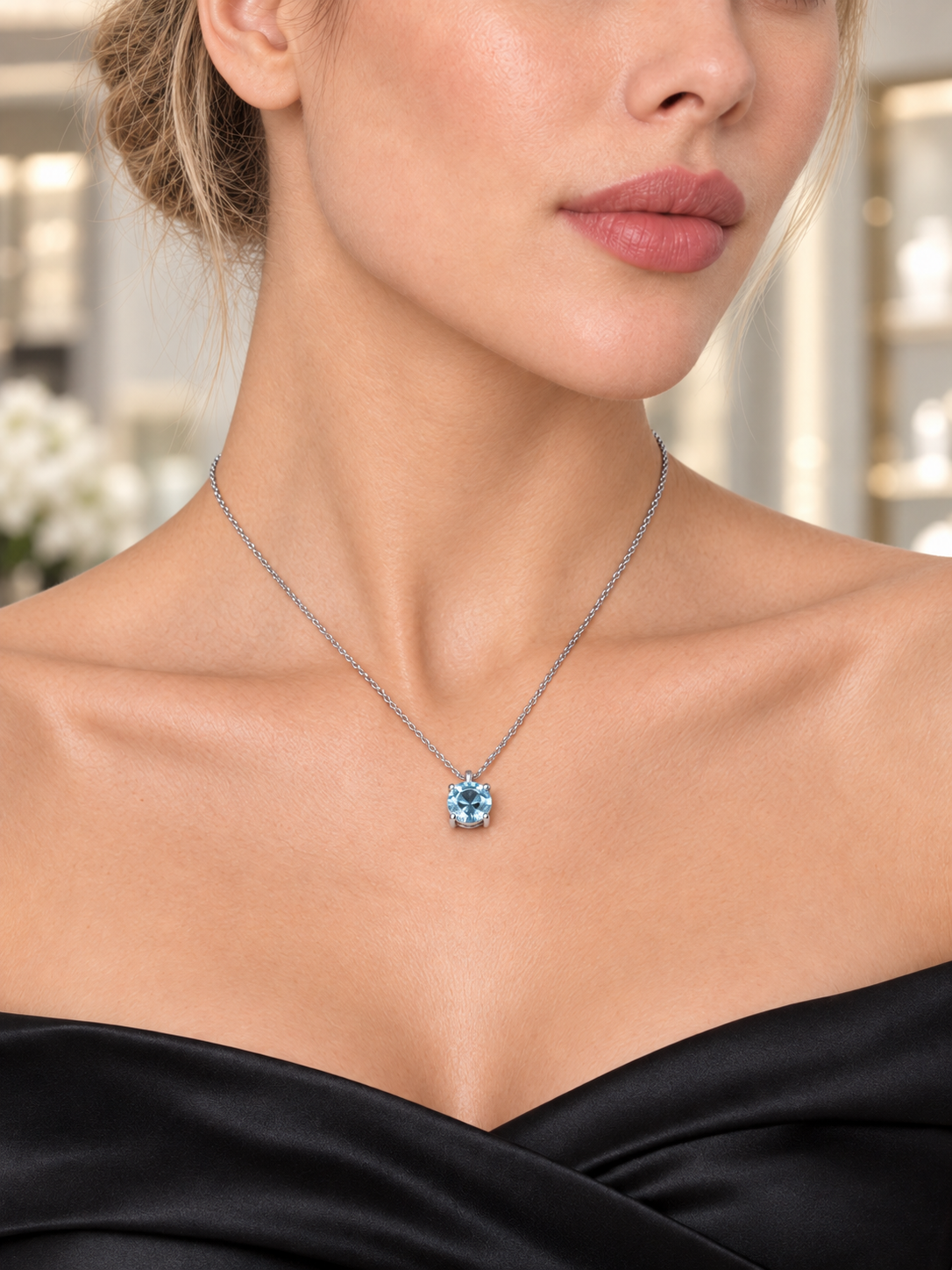 Close-up of Ice Blue CZ Pendant Necklace being worn