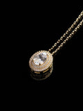 Oval Double Halo Gold Necklace on a black background