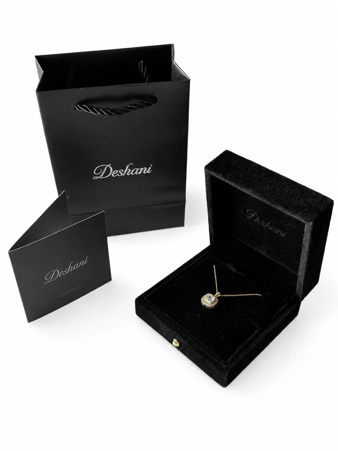 Detail view of Gold Cube Pendant Necklace