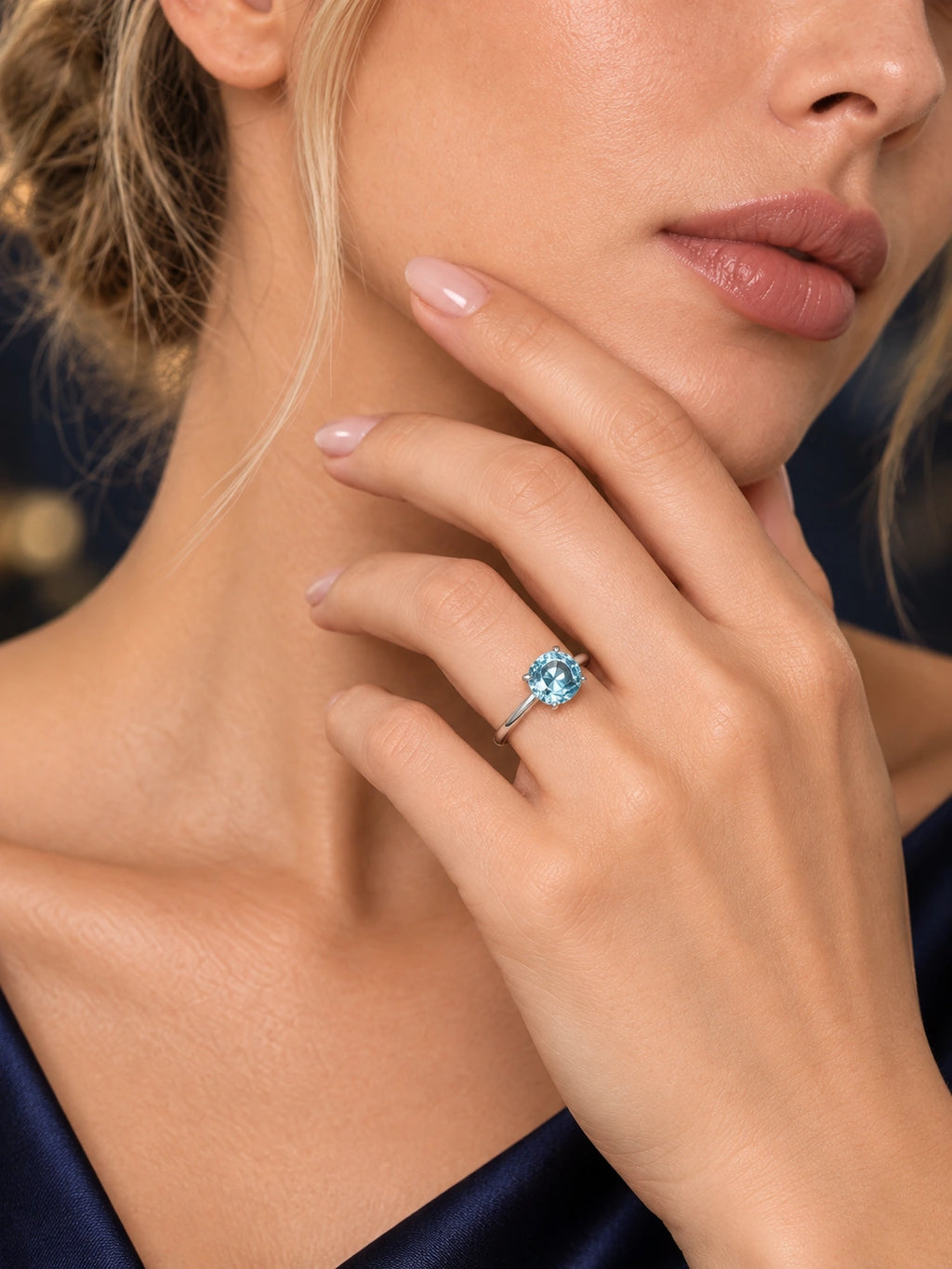 Close-up of Two-Tone Blue CZ Ring being worn