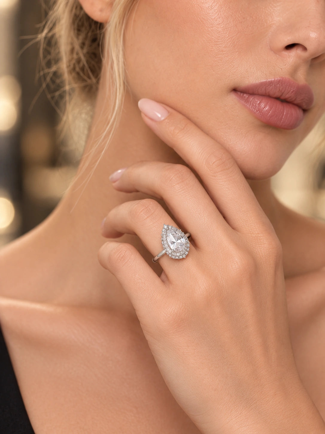 Close-up of Pear-Cut Double Halo Open Ring being worn