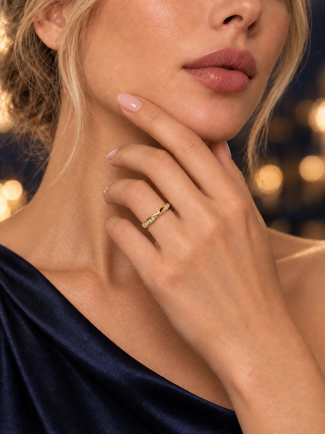 Close-up of Gold Wave Pavé Band being worn